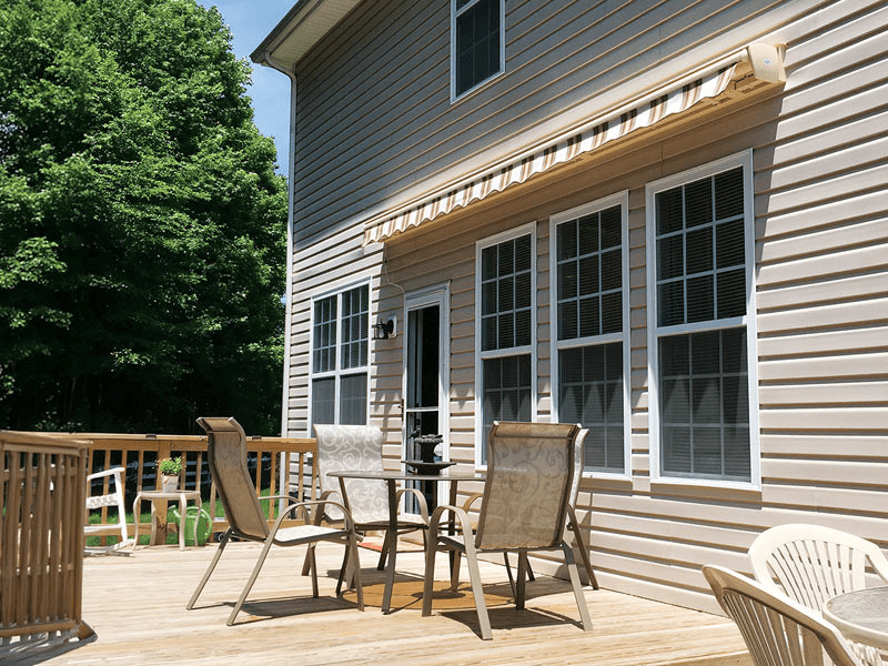 Backyard space before a retractable awning installation